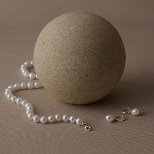 Woman wearing wedding day jewellery